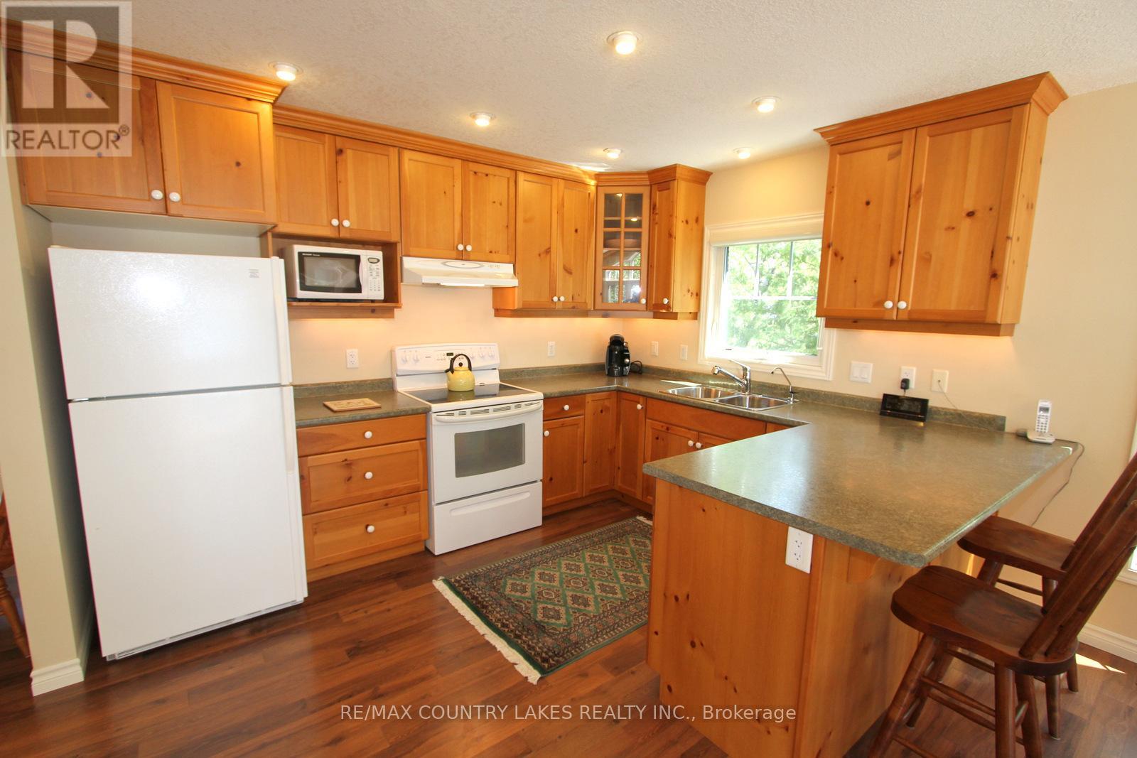 275 Mcguire Beach Road, Kawartha Lakes, Ontario  K0M 2B0 - Photo 15 - X12987344