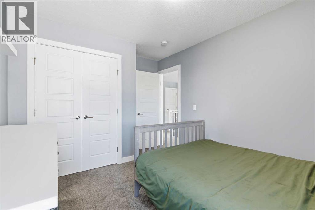 12 Ranchers Bay, Okotoks, Alberta  T1S 0P2 - Photo 28 - A2297121