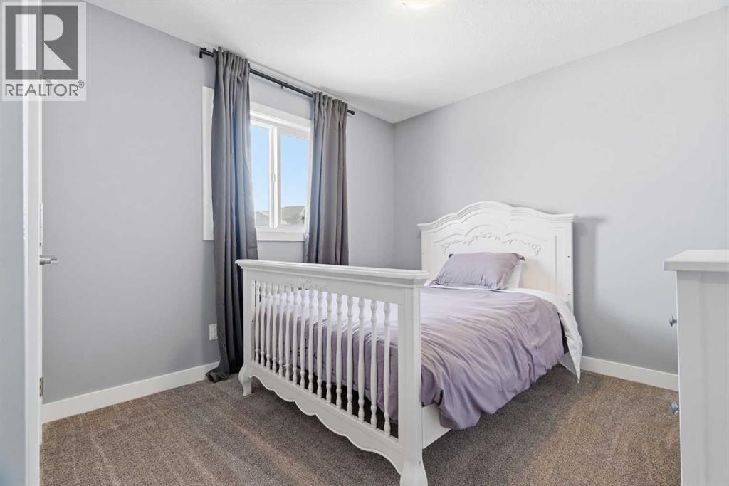 12 Ranchers Bay, Okotoks, Alberta  T1S 0P2 - Photo 29 - A2297121