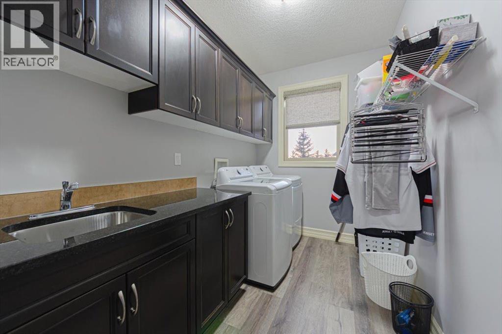 115 Montclair Place, Rural Rocky View County, Alberta  T4C 0A7 - Photo 25 - A2299384