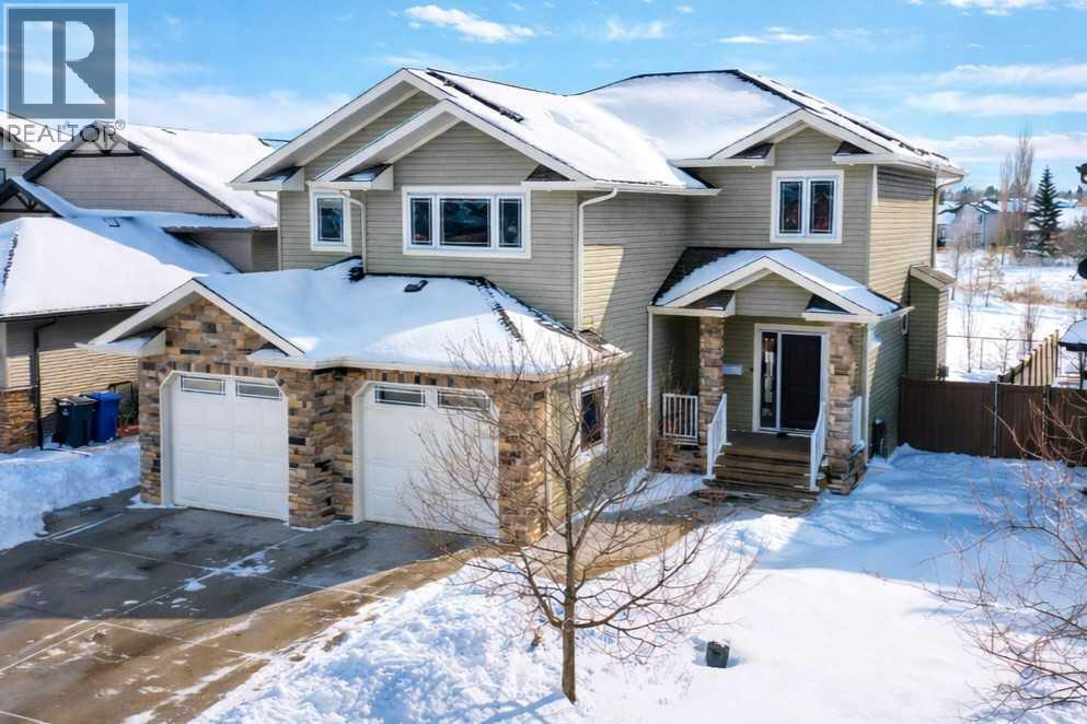 <div class="slider-price">$690,000.00</div><p>5315 48 Street, Innisfail, Alberta</p>