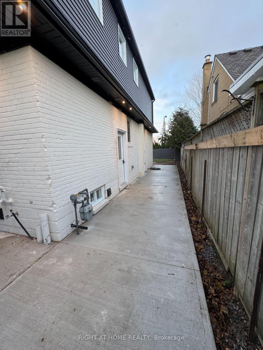 1 Random Street, Toronto, Ontario  M9B 2J3 - Photo 3 - W12987602