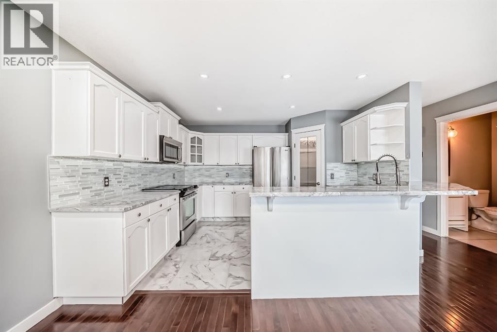 40 Cimarron Crescent, Okotoks, Alberta  T1S 1S7 - Photo 3 - A2286719