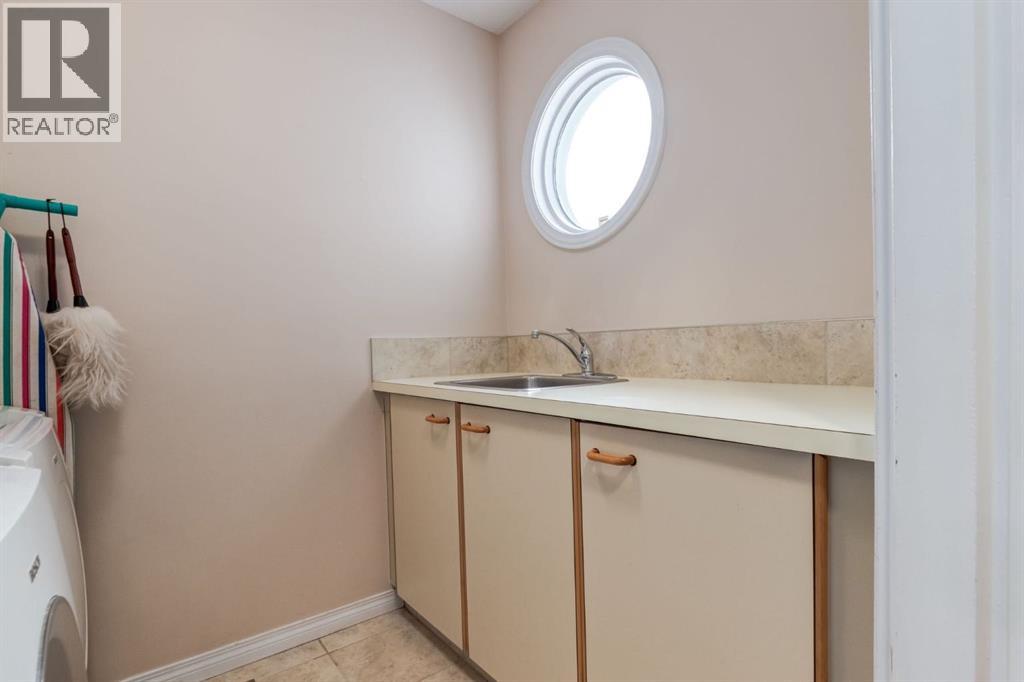 51 Woodacres Crescent Sw, Calgary, Alberta  T2W 4V5 - Photo 24 - A2298947