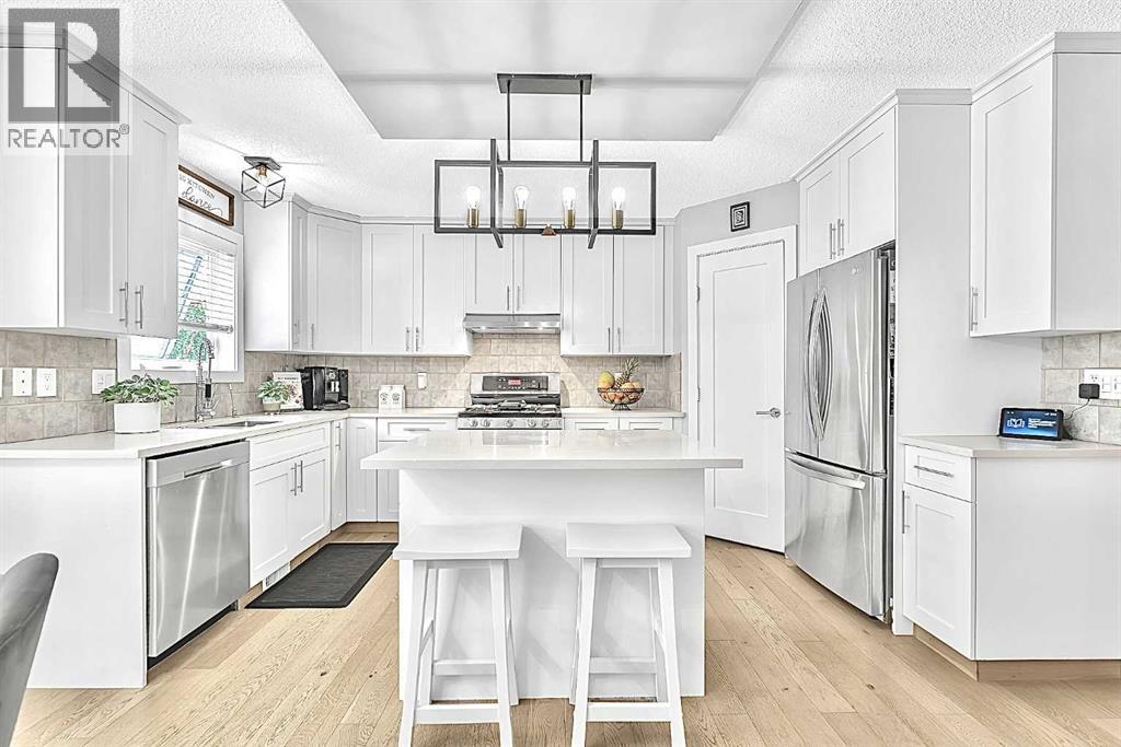 419 Rocky Ridge Bay Nw, Calgary, Alberta  t3g 4h8 - Photo 9 - A2299448