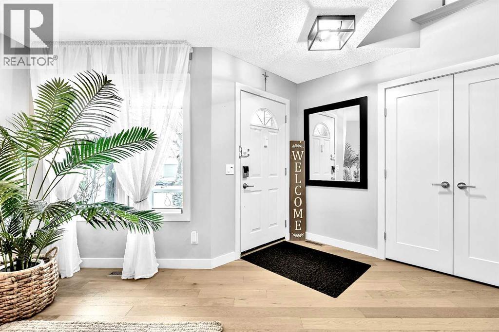 419 Rocky Ridge Bay Nw, Calgary, Alberta  t3g 4h8 - Photo 3 - A2299448