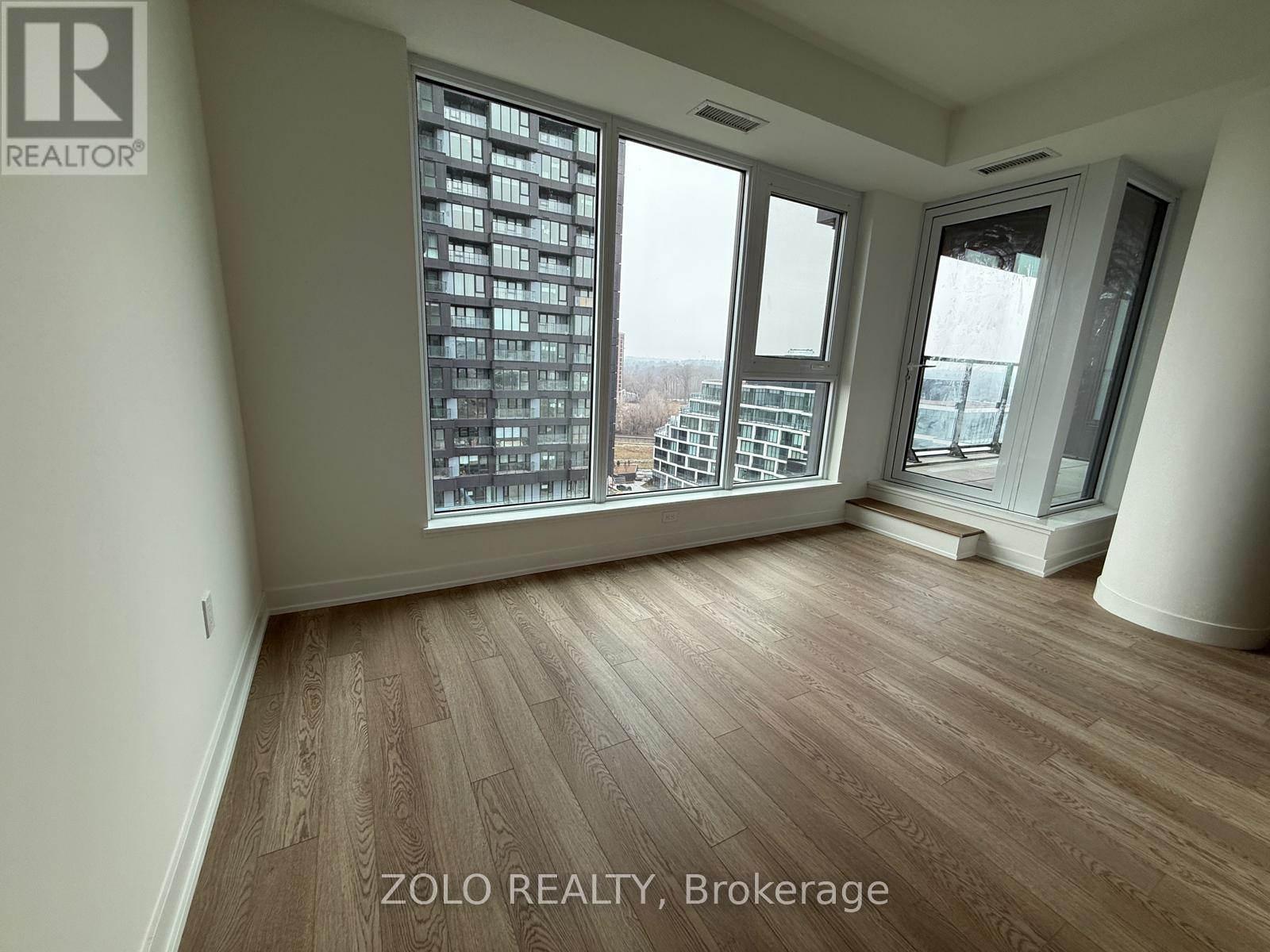 1002 - 5 Quarrington Lane, Toronto, Ontario  M3C 0S4 - Photo 2 - C12987818