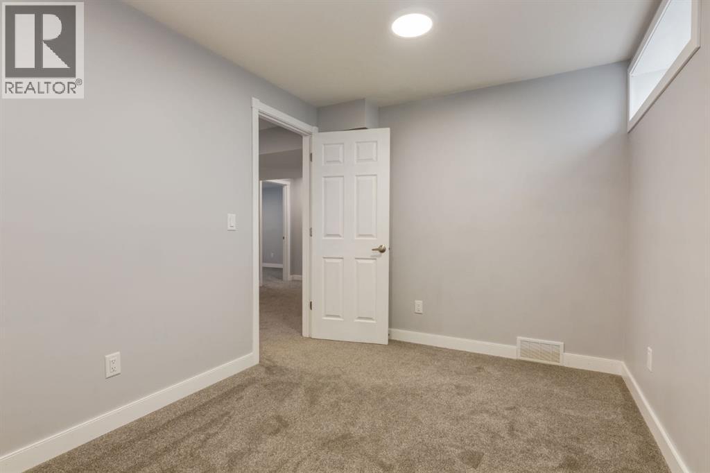 82 Hidden Ridge View Nw, Calgary, Alberta  T3A 5V8 - Photo 46 - A2300274