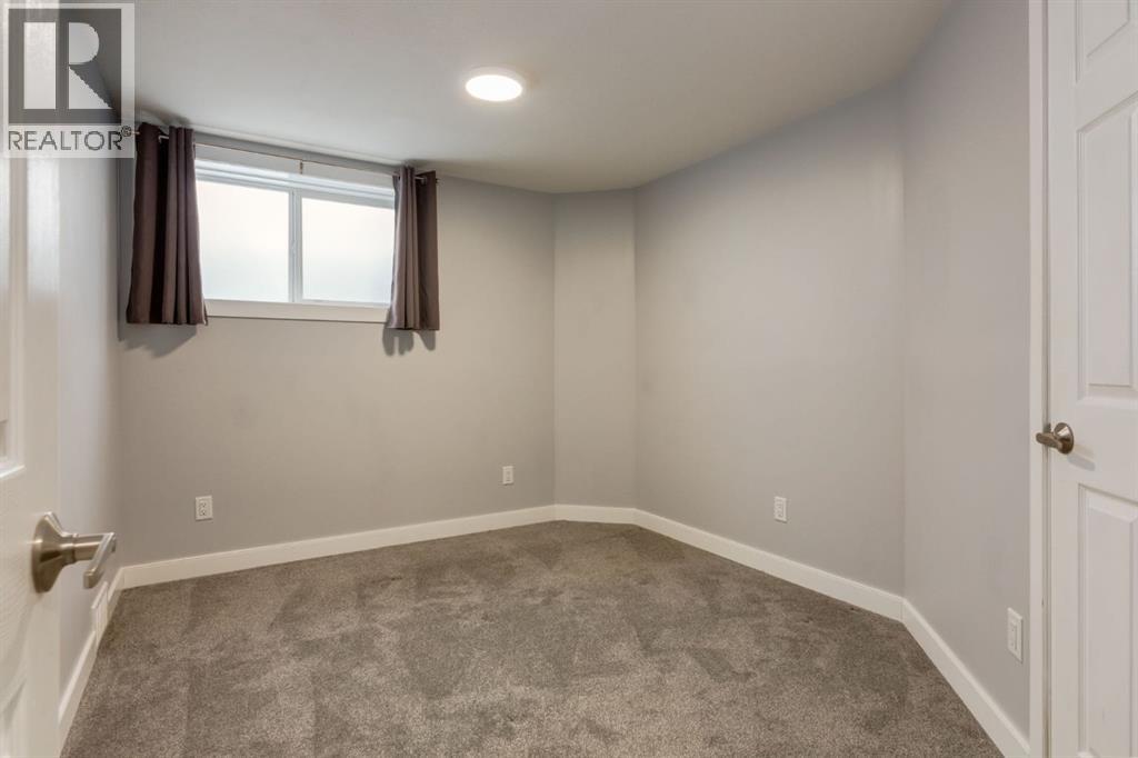 82 Hidden Ridge View Nw, Calgary, Alberta  T3A 5V8 - Photo 41 - A2300274