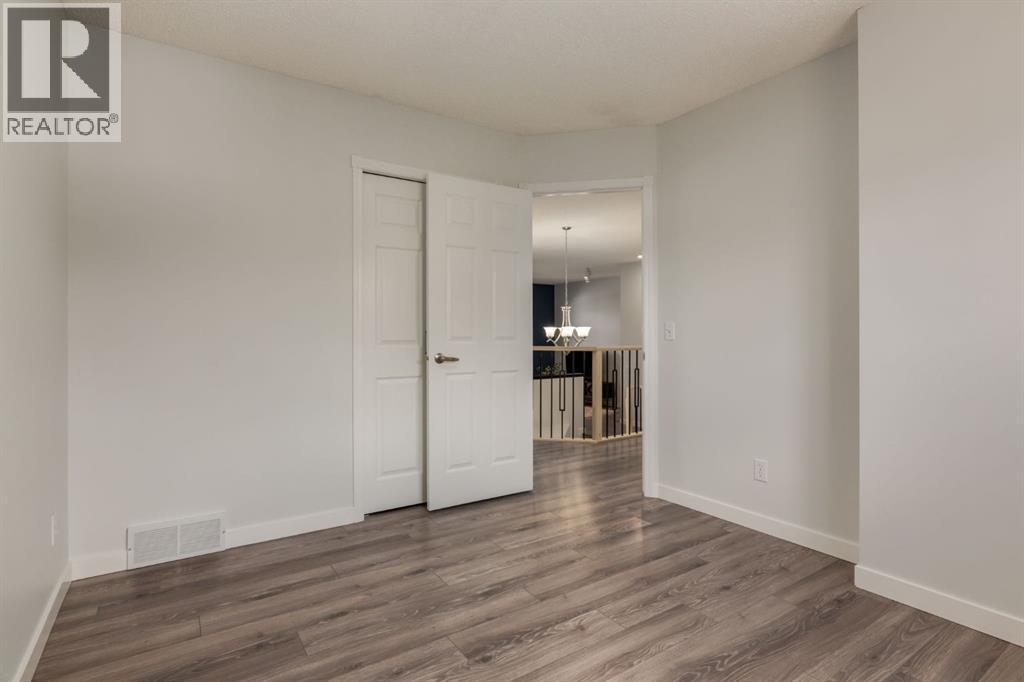 82 Hidden Ridge View Nw, Calgary, Alberta  T3A 5V8 - Photo 33 - A2300274