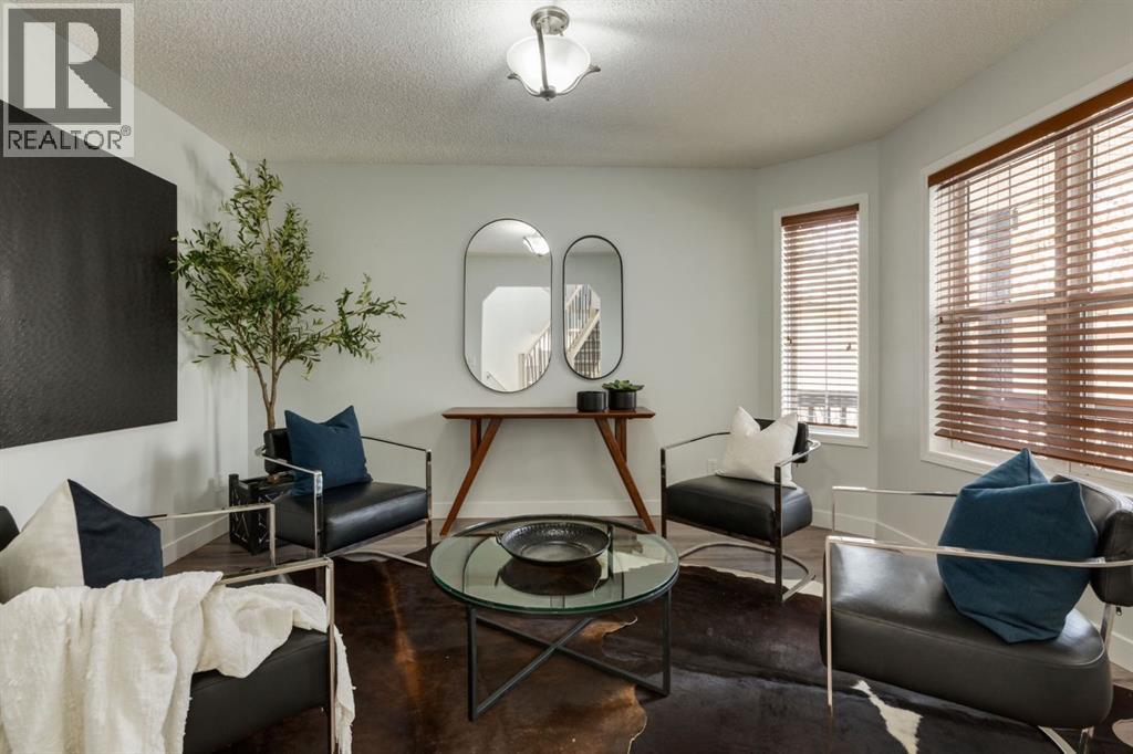 82 Hidden Ridge View Nw, Calgary, Alberta  T3A 5V8 - Photo 4 - A2300274