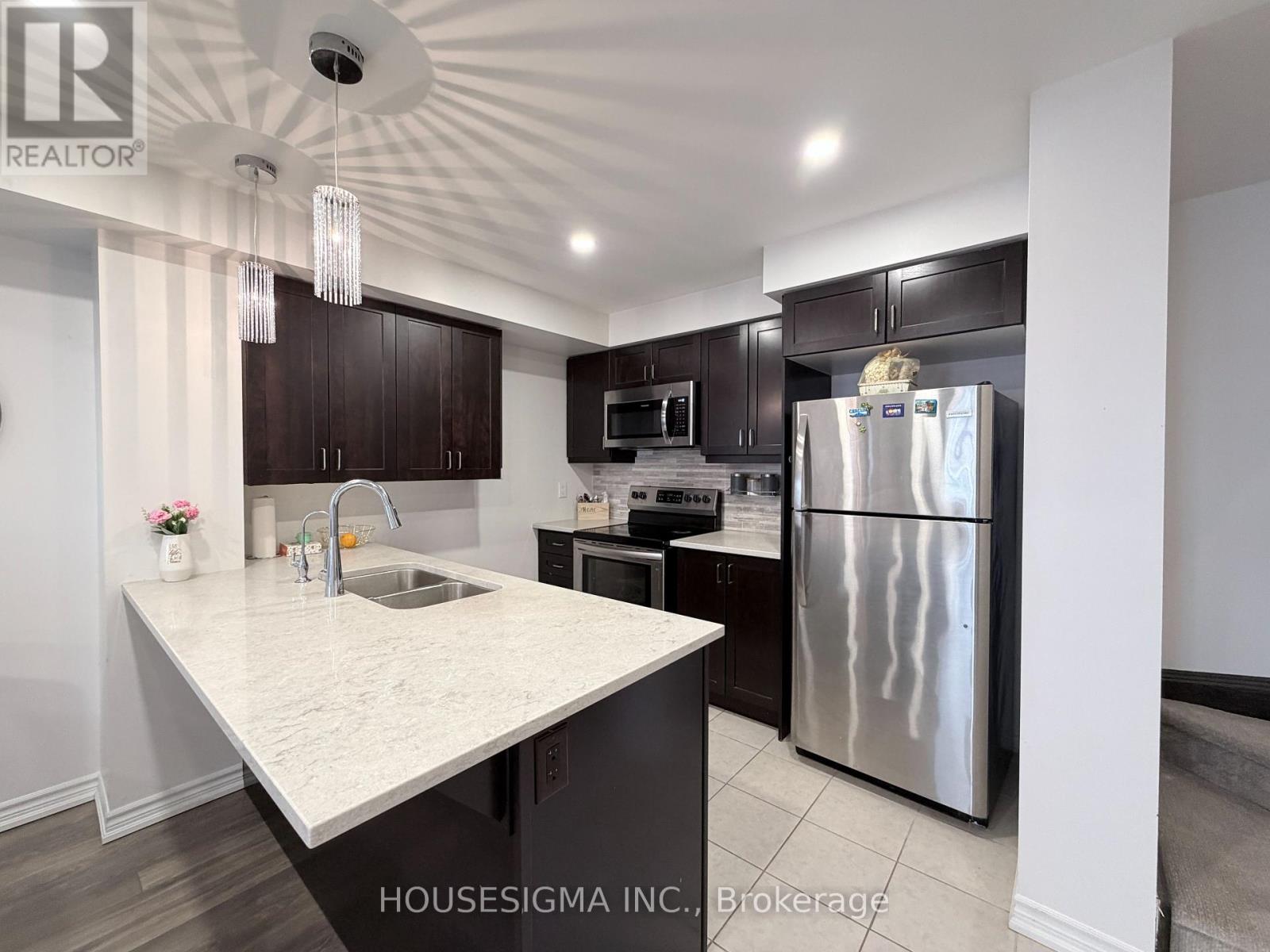 50 - 1222 Rose Way, Milton, Ontario  L9E 1P1 - Photo 8 - W12894868