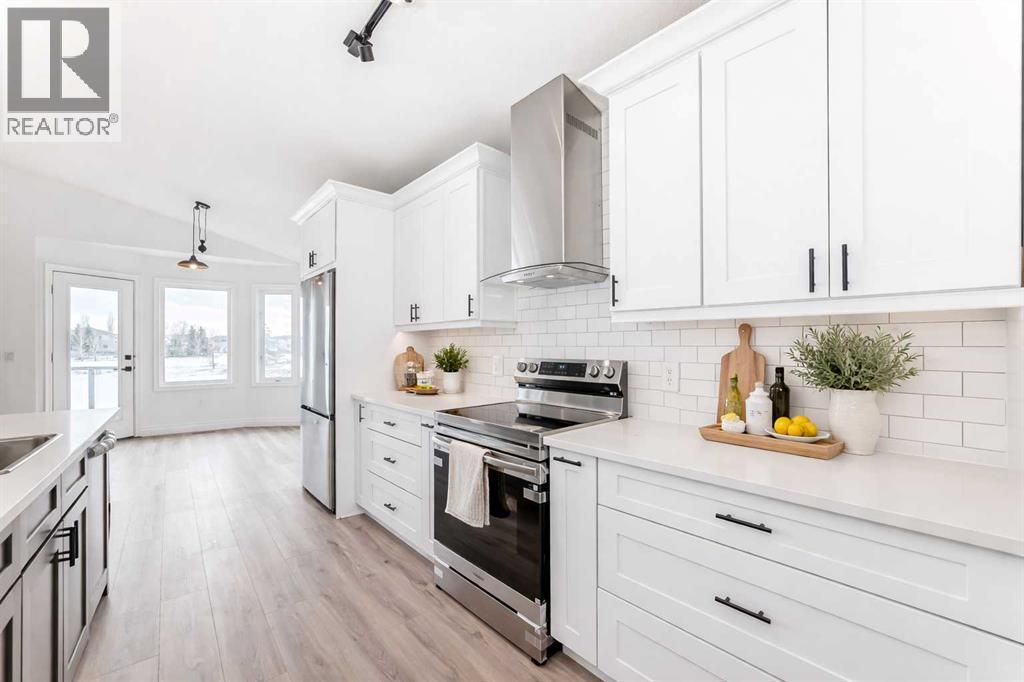 228 Woodside Crescent Nw, Airdrie, Alberta  T4B 2G8 - Photo 8 - A2298688