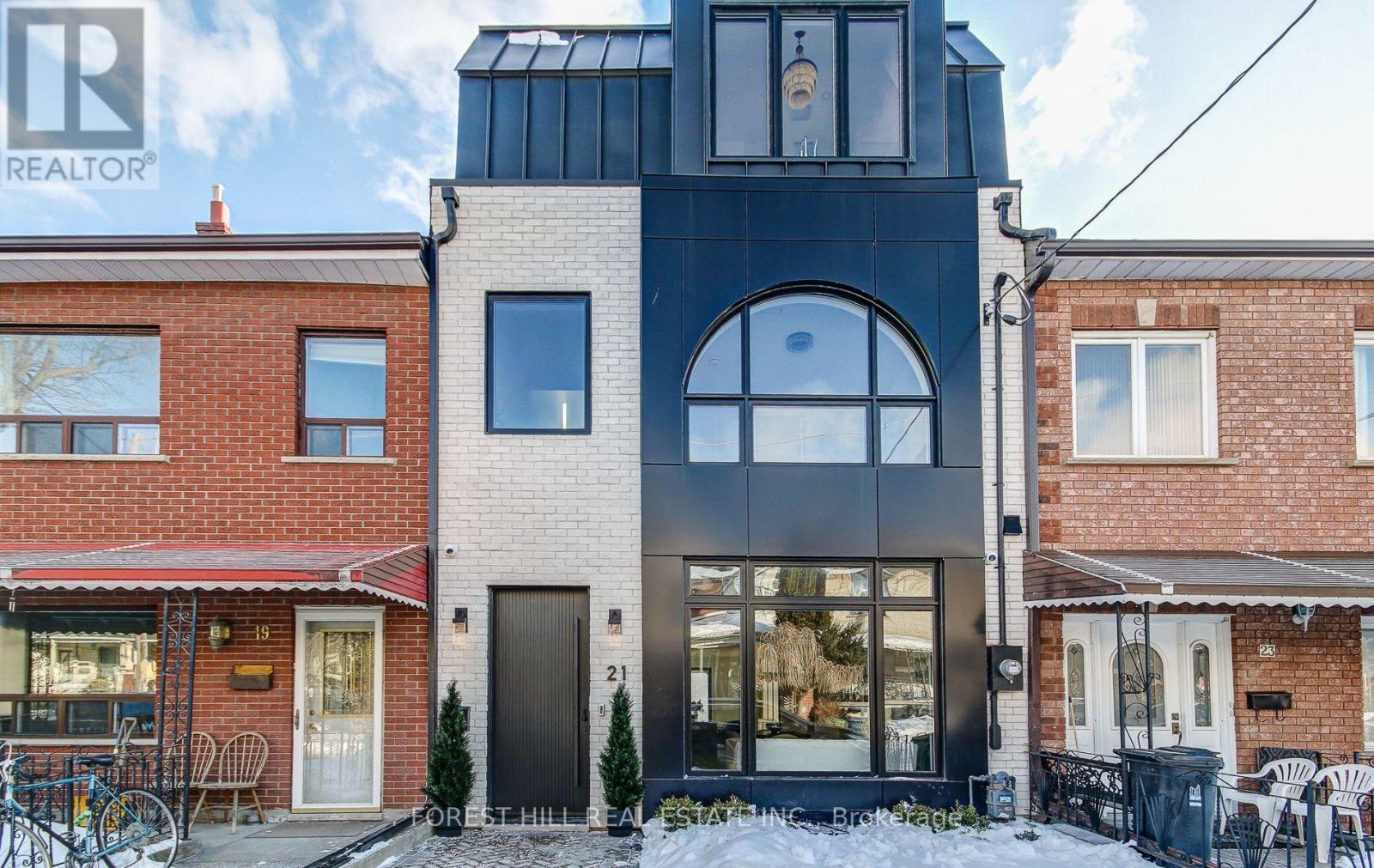 A rare offering on one of Trinity-Bellwoods most coveted streets, 21 Foxley Street is a Custom Designed, Brand new architectural gem that blends timeless elegance with modern sophistication. Set on an exceptionally deep 130-ft lot and offering over 3,500 sqft, this residence features 4+1 Bedrooms, 6 Bathrooms, and soaring ceilings throughout. The main level showcases refined open-concept living, anchored by a Designer Chef's kitchen with a full pantry wall, sculptural curved fluted island, and Top-Tier Fisher & Paykel Appliances. Upper levels offer Three Ensuite Bedrooms and a spectacular third-floor primary retreat with an expansive private terrace, striking CN Tower views, spa-inspired ensuite, and custom dressing room. The fully finished lower level includes a Home Theatre, recreation space with full kitchen, Fifth Bedroom, and Second laundry. Complete with premium finishes, integrated technology, and a 12-ft high Double Car Garage with EV charger. Ideally positioned in the heart of Trinity-Bellwoods, just steps to top-rated schools and TTC. Set within one of the City's most dynamic enclaves, offering world-class restaurants, sophisticated nightlife, distinctive boutiques, and a vibrant arts community. A home that truly stands apart! (id:48254)