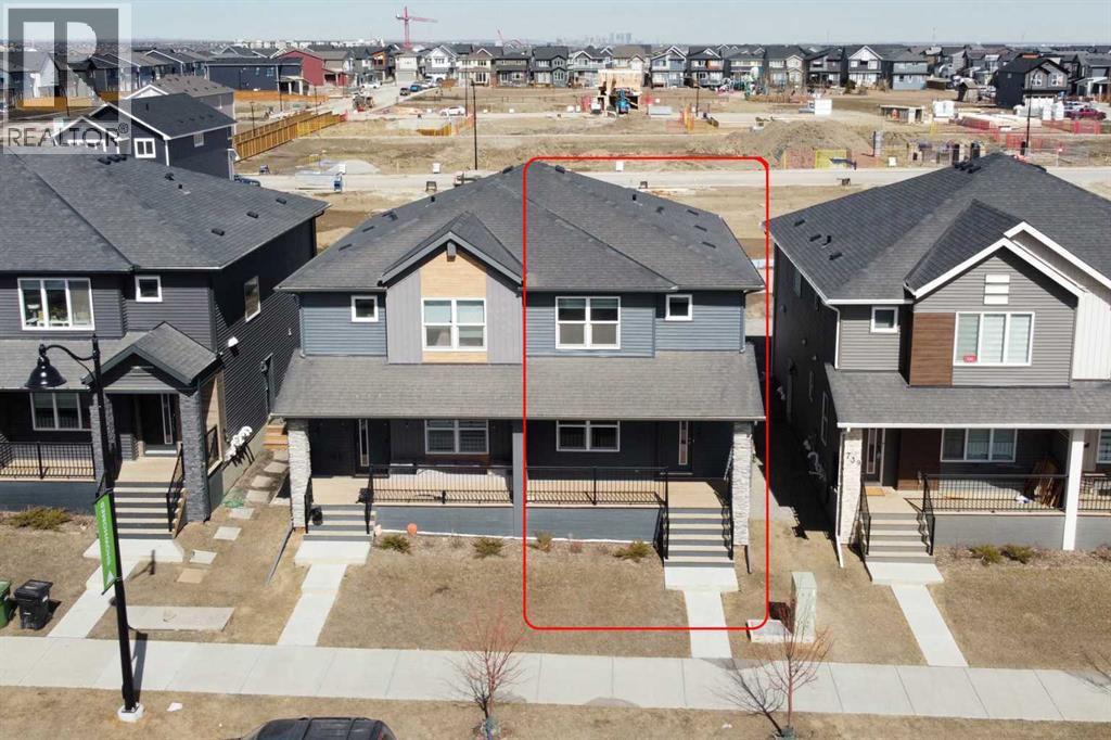 747 Creekside Boulevard Sw, Calgary, Alberta  T2X 5H1 - Photo 2 - A2298880