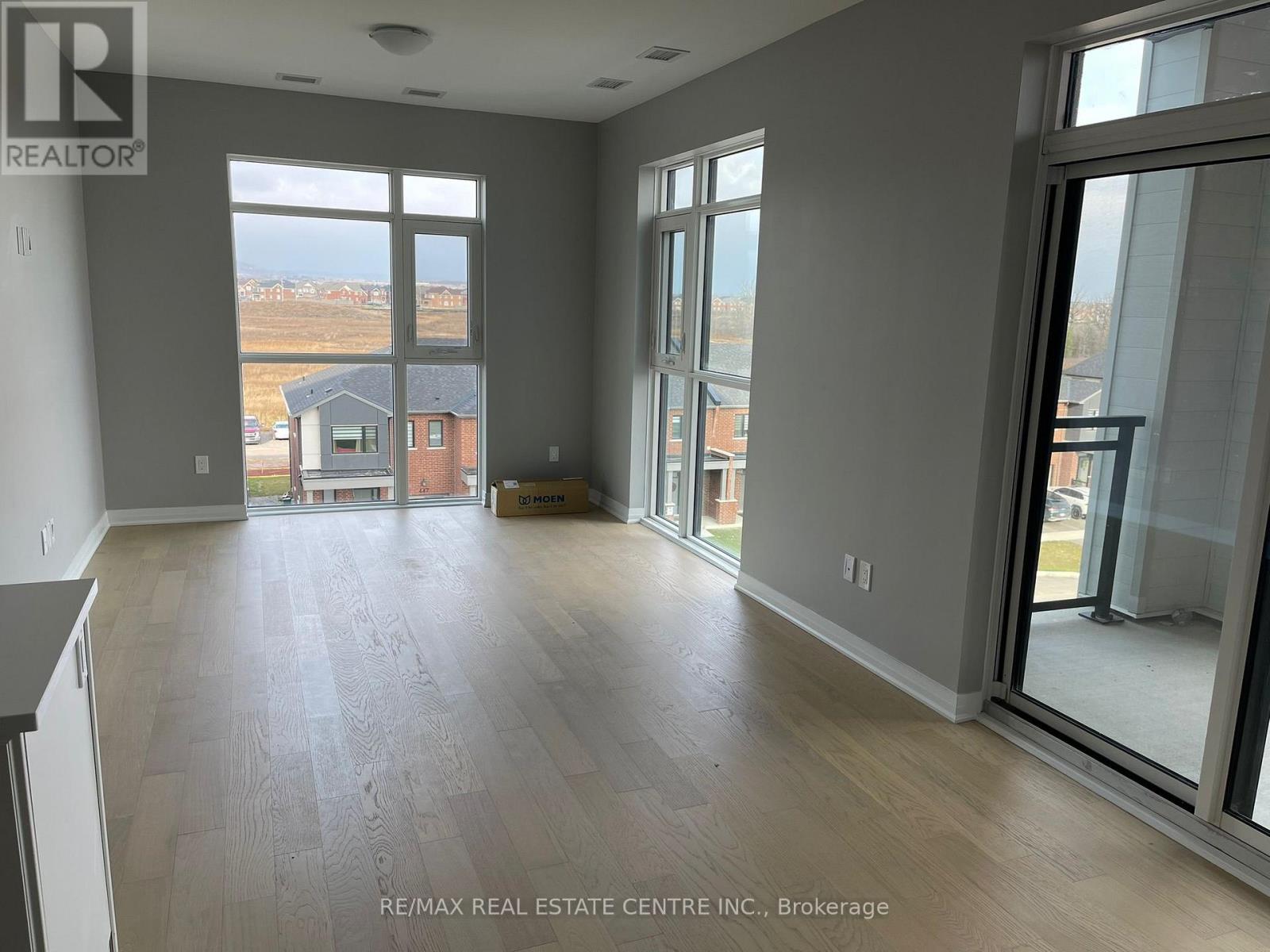 401 - 460 Gordon Krantz Avenue, Milton (Walker), Ontario  L9E 1Z2 - Photo 4 - W12975668