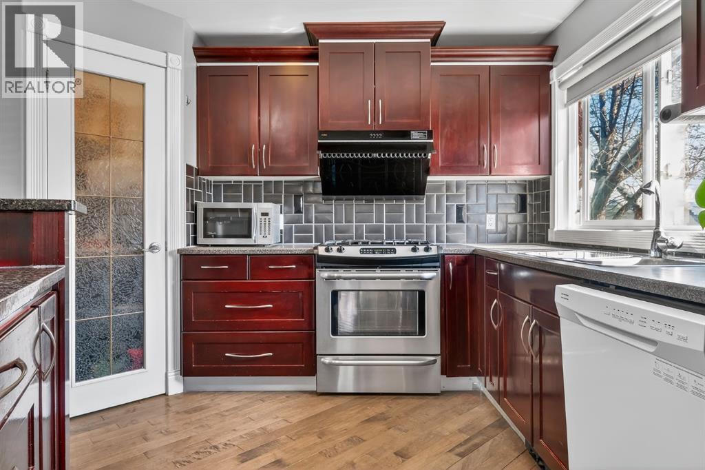 1027 75 Avenue SW, Calgary, Alberta  T2V 0S7 - Photo 9 - A2298788