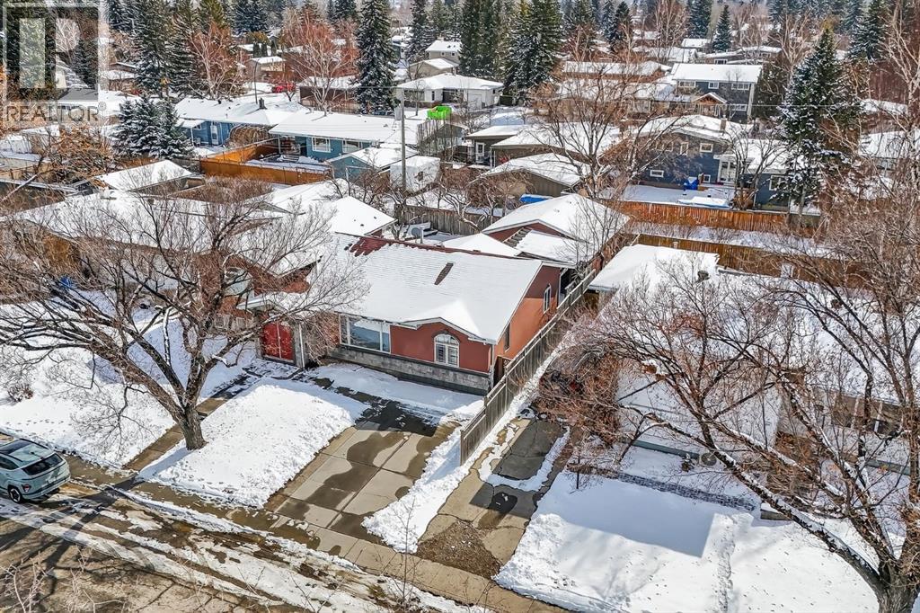 1027 75 Avenue SW, Calgary, Alberta  T2V 0S7 - Photo 2 - A2298788