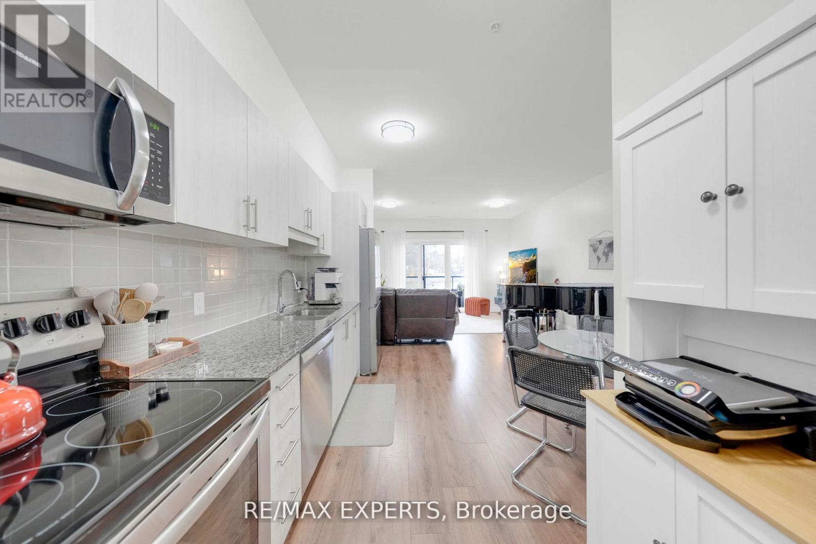 205 - 64 Queen Street S, New Tecumseth, Ontario  L0G 1W0 - Photo 9 - N12988266