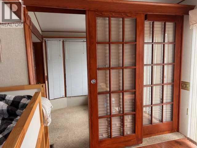 561 Carefree Resort, Rural Red Deer County, Alberta  T4G 0K6 - Photo 5 - A2286689