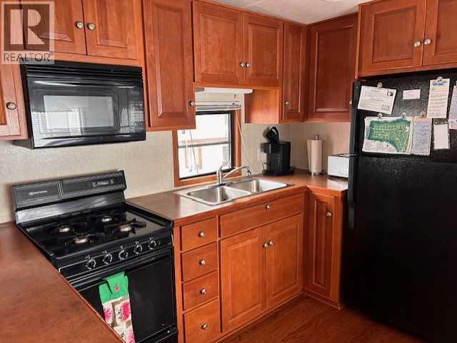 561 Carefree Resort, Rural Red Deer County, Alberta  T4G 0K6 - Photo 2 - A2286689