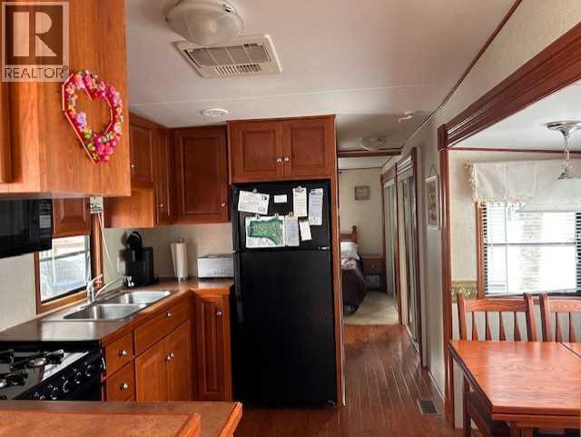 561 Carefree Resort, Rural Red Deer County, Alberta  T4G 0K6 - Photo 1 - A2286689