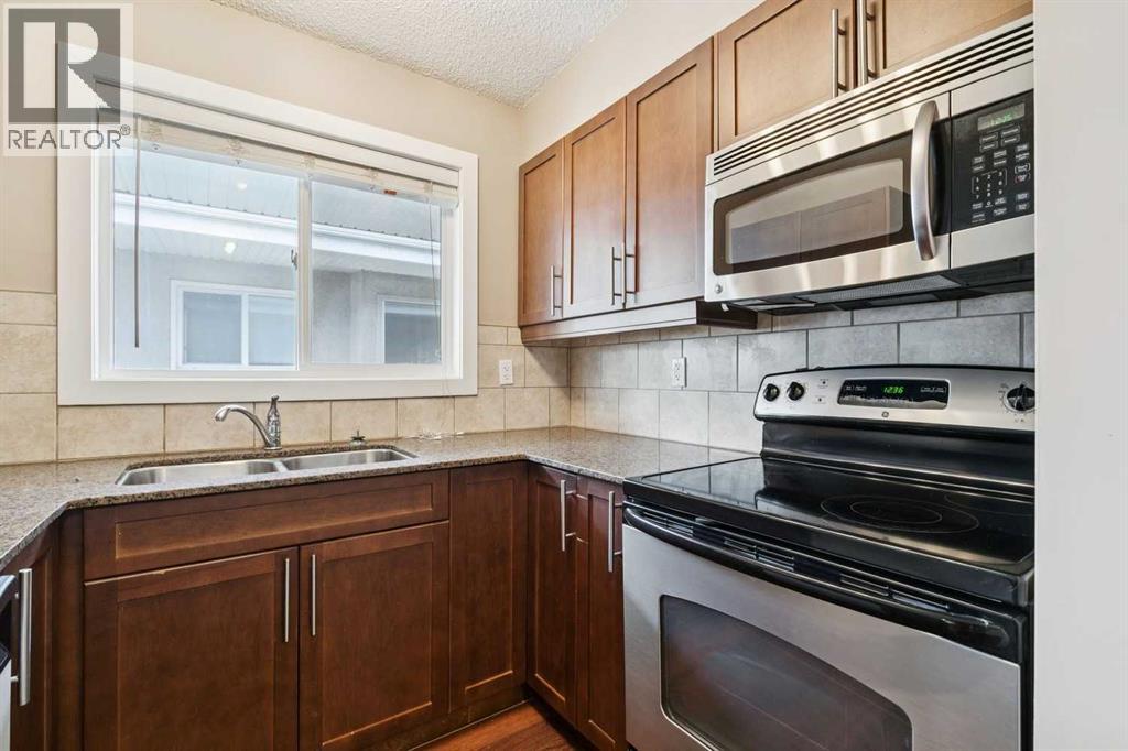 4, 605 67 Avenue Sw, Calgary, Alberta  T2V 0M3 - Photo 5 - A2300361