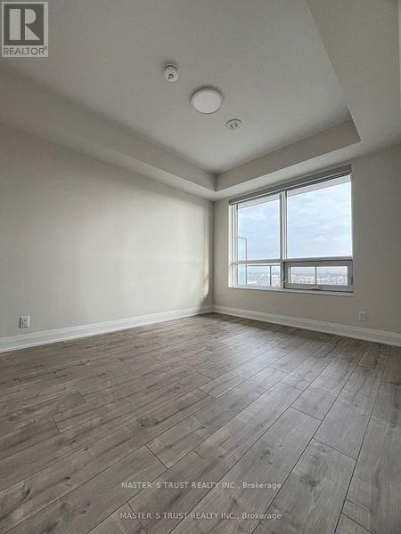 1201 - 18 Water Walk Drive, Markham, Ontario  L3R 6L5 - Photo 5 - N12988666