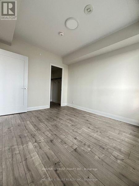 1201 - 18 Water Walk Drive, Markham, Ontario  L3R 6L5 - Photo 6 - N12988666