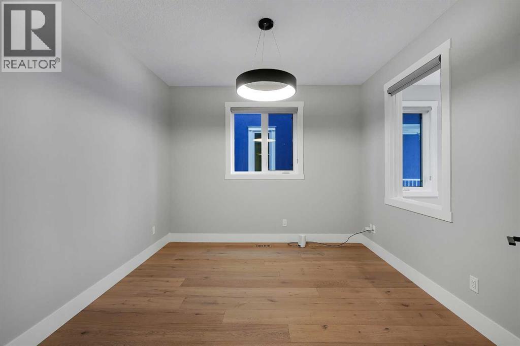 106 Rock Lake Heights Nw, Calgary, Alberta  T3G 0G3 - Photo 3 - A2298601