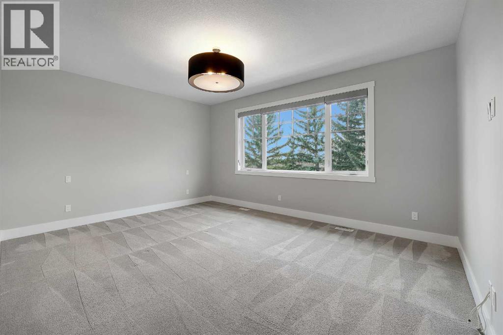 106 Rock Lake Heights Nw, Calgary, Alberta  T3G 0G3 - Photo 24 - A2298601