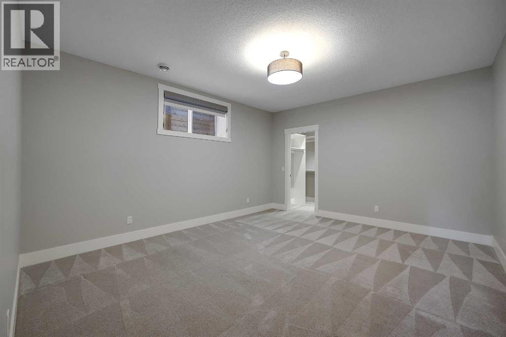 106 Rock Lake Heights Nw, Calgary, Alberta  T3G 0G3 - Photo 13 - A2298601