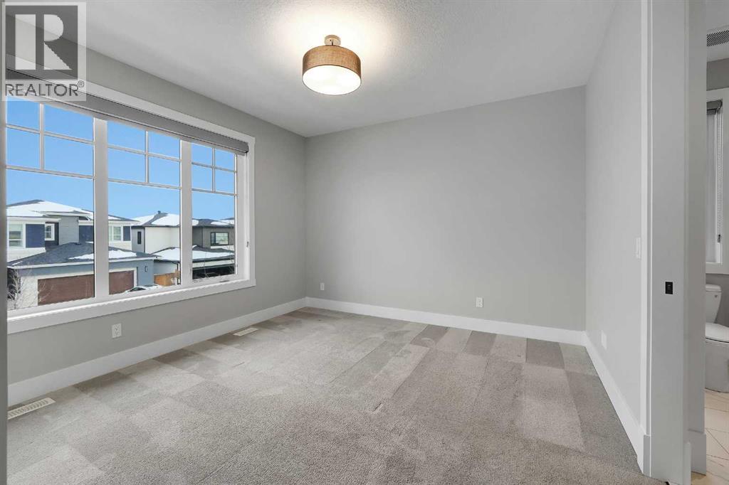 106 Rock Lake Heights Nw, Calgary, Alberta  T3G 0G3 - Photo 23 - A2298601