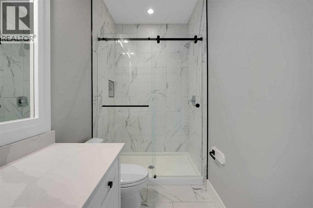 106 Rock Lake Heights Nw, Calgary, Alberta  T3G 0G3 - Photo 18 - A2298601