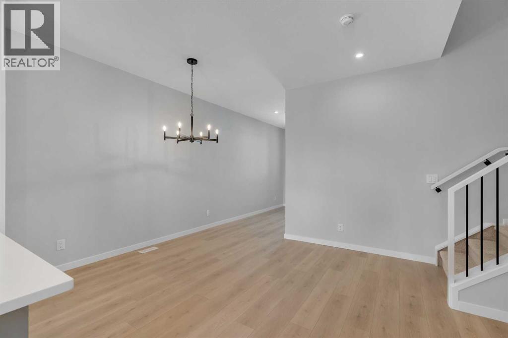 1277 Creekview Drive Sw, Calgary, Alberta  T2X 4Y1 - Photo 7 - A2271942