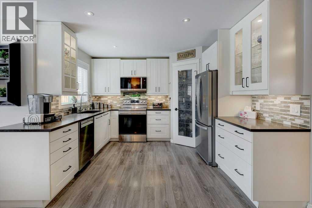 2033 Sagewood Point Sw, Airdrie, Alberta  T4b 3P1 - Photo 4 - A2293088