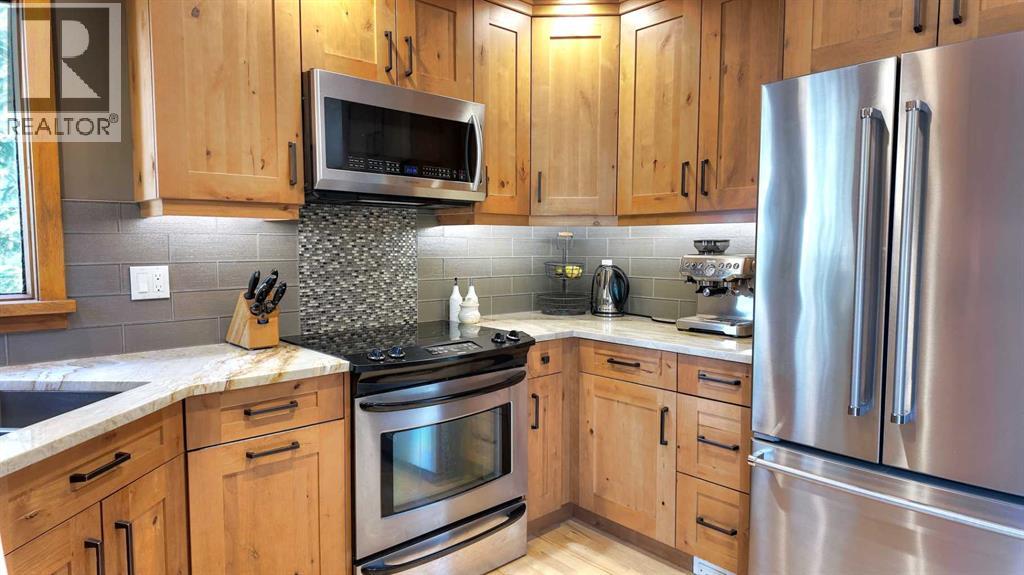 226 Lady Macdonald Drive, Canmore, Alberta  T1W 1H3 - Photo 9 - A2301104