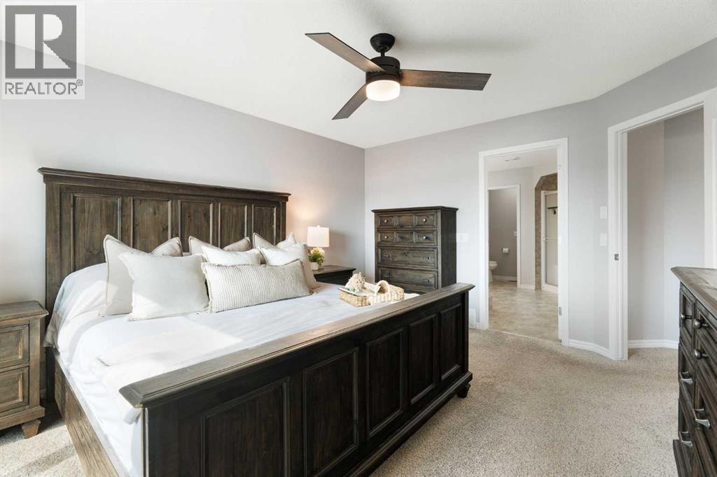 142 Coopers Bay Sw, Airdrie, Alberta  T4B 3K2 - Photo 23 - A2298253