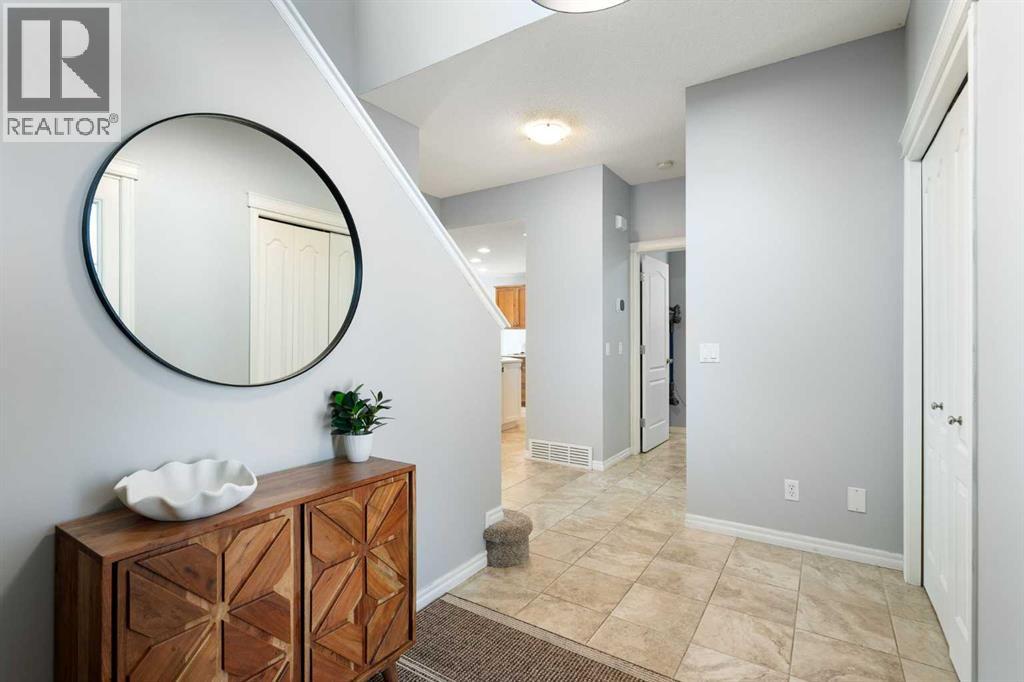 142 Coopers Bay Sw, Airdrie, Alberta  T4B 3K2 - Photo 3 - A2298253