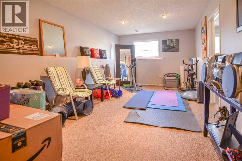 4, 33 Stonegate Drive Nw, Airdrie, Alberta  T4B 2V9 - Photo 27 - A2300987