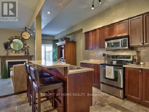 2422 Shadow Court, Oakville, Ontario  L6M 5G6 - Photo 4 - W12988902