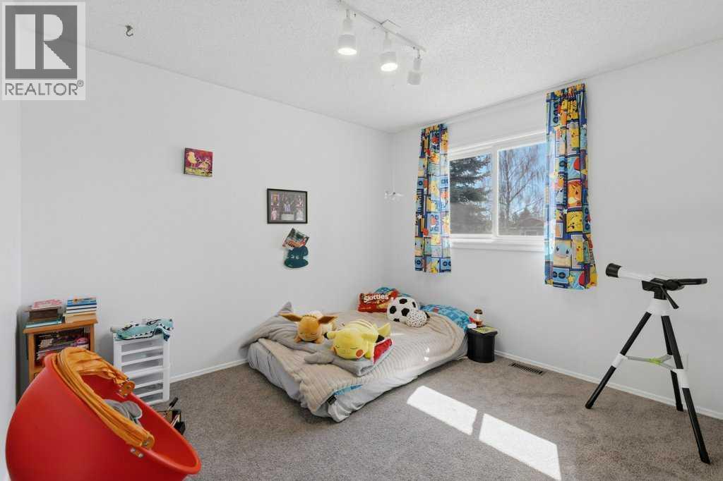 536 Woodhill Place SW, Calgary, Alberta  T2W 3L5 - Photo 23 - A2299102