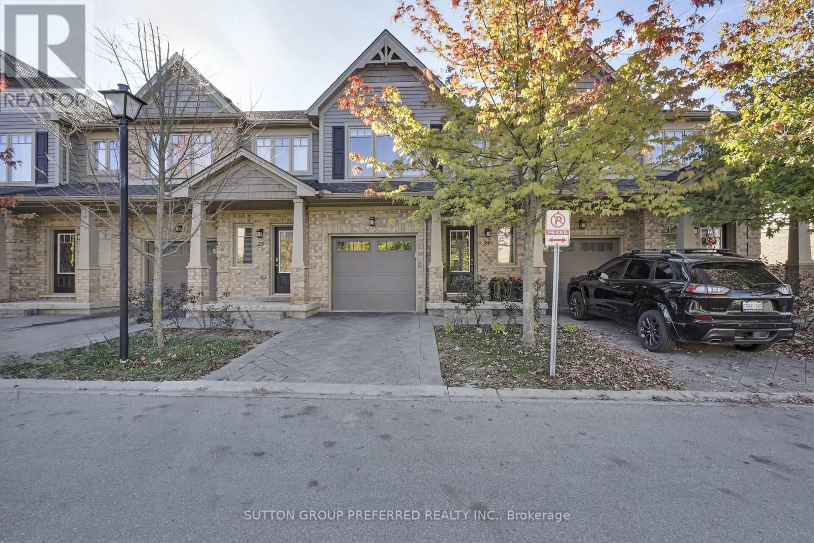 Welcome to this stunning 3-bedroom, 3.5-bathroom condo offering over 2,000 sq. ft. of beautifully finished living space in one of North Londons most unknown and desirable communities. Perfectly situated down the road from Cedarhollow Public School, trails to the Thames River, shopping, parks, and with easy access to Highway 401, this home combines comfort, convenience, and style in one incredible package. From the moment you step inside, you'll notice the bright, open layout and thoughtful finishes that make this condo truly stand out. The kitchen features sleek quartz countertops, a contemporary backsplash, and an abundance of workspace perfect for the home chef or for casual family living. The adjoining dining and great room create a warm and inviting space for entertaining, while sliding patio doors lead to a private, south-facing deck ideal for enjoying morning coffee or summer evenings outdoors. Upstairs, the primary retreat offers the perfect balance of luxury and practicality with a spacious walk-in closet and ensuite bathroom. Two additional bedrooms are generously sized and share a well-appointed full bath, making this level ideal for family or guests.The finished lower level expands your living options with oversized windows that fill the rec room with natural light. A full bathroom and a clever built-in desk nook provide versatility whether you need a home office, homework station, or creative play area, the space adapts to your needs with ease. Additional highlights include an attached garage with 50 amp outlet ready for EV charger, interior entry, modern flooring throughout, fresh neutral décor, and a move-in ready presentation that feels better than new. This North London gem offers exceptional living space, modern upgrades, and an unbeatable location. Don't miss your chance to make it yours! (id:48254)