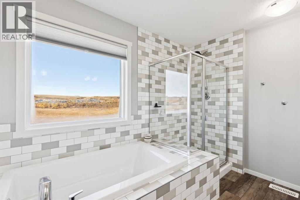 57 Crestridge Bay Sw, Calgary, Alberta  T3B 6H2 - Photo 24 - A2299421