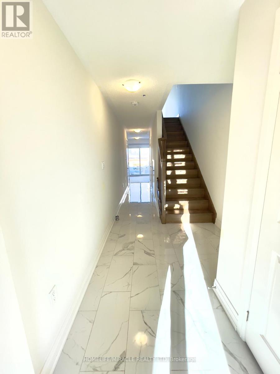 87 Windtree Way, Halton Hills, Ontario  L7G 0P6 - Photo 3 - W12989404