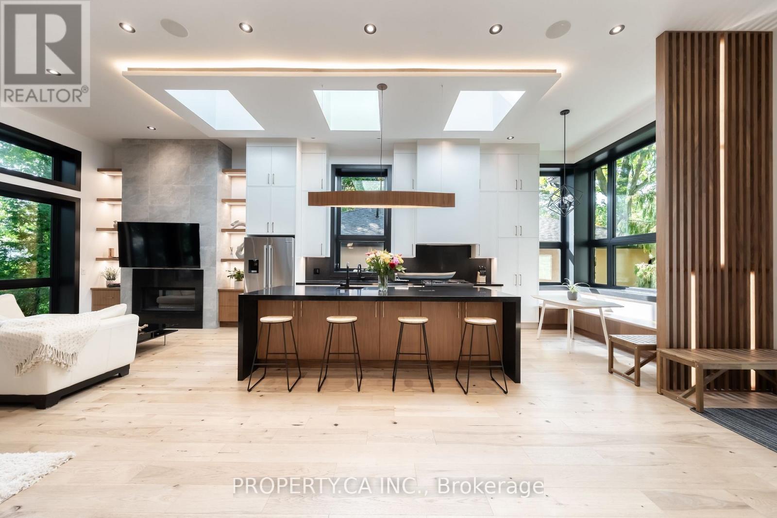 Welcome To 58 Farningham Cres - Nestled On One Of The Most Prestigious Streets In Princess - Rosethorn, This Is One Of Toronto's First Net Zero Ready Custom Homes. It Is A Rare Fusion Of Modern Luxury, Timeless Elegance, And Sustainable Design Of Over 4,000 Square Feet Of Space. The Main Level Combines Kitchen With Living Space And Has A Soaring 12-Ft Ceiling. The Open-Concept Layout Has Floor-To-Ceiling Windows And Skylights Creating An Airy, Light-Filled Space. The Chefs Kitchen Is The Heart Of The Home, Featuring A Dramatic 10-Ft Quartz Island, Built-In Wine Fridge, Prep Sink, High-End Appliances Including A 6-Burner Gas Stove, And A Cozy Breakfast Nook. The Elegant Dining Area Includes A Walk-Out To The Backyard, Plus A Convenient Servery/Bar With A Second Dishwasher Perfect For Entertaining. Relax In The Living Room By The Wood-Burning Fireplace, A Rare Luxury In Modern Builds. The Main-Floor Also Has A Private Suite With Its Own En-Suite Bath Which Offers Flexibility For Guests Or Multi-Generational Living. Upstairs, The Primary Retreat Is A True Sanctuary With A Spa-Inspired En-Suite Bath Featuring Heated Floors, A Freestanding Tub, Glass Shower, Double Vanity, And A Stunning Oversized Private Balcony - Perfect For Relaxing Outdoors. This Home Is Built For Comfort And Efficiency With A Full Heat Pump System For Heating, Cooling, And Hot Water. It Has Upgraded Insulation, Triple-Pane Windows, And High-Efficiency Doors Ensuring Long-Term Energy Savings And Providing Unmatched Comfort. The Legal Basement Apartment Adds Extra Value And Is Ideal For In-Laws, For Rental Income, Or Personal Use. All Of This In A Highly Sought-After Princess - Rosethorn Neighbourhood. All offers welcome! (id:48254)