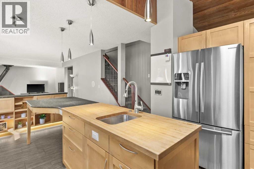 244 Ranchridge Bay NW, Calgary, Alberta  T3G 1V4 - Photo 4 - A2296107