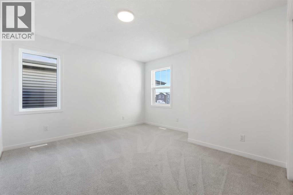 215 Corner Glen Crescent NE, Calgary, Alberta  T3N 2P1 - Photo 14 - A2273993