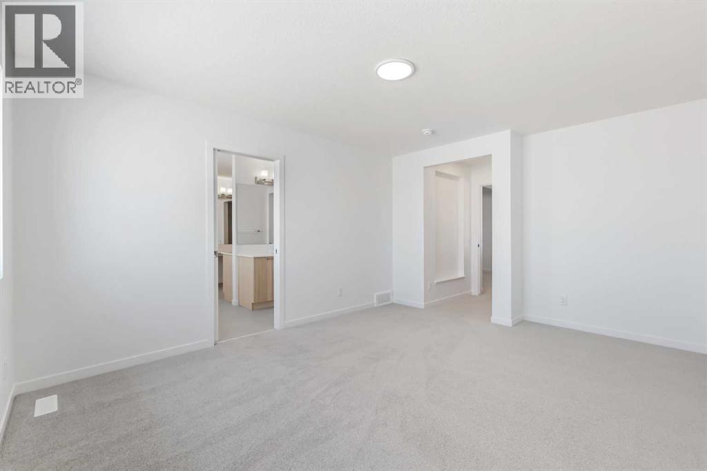 215 Corner Glen Crescent NE, Calgary, Alberta  T3N 2P1 - Photo 11 - A2273993