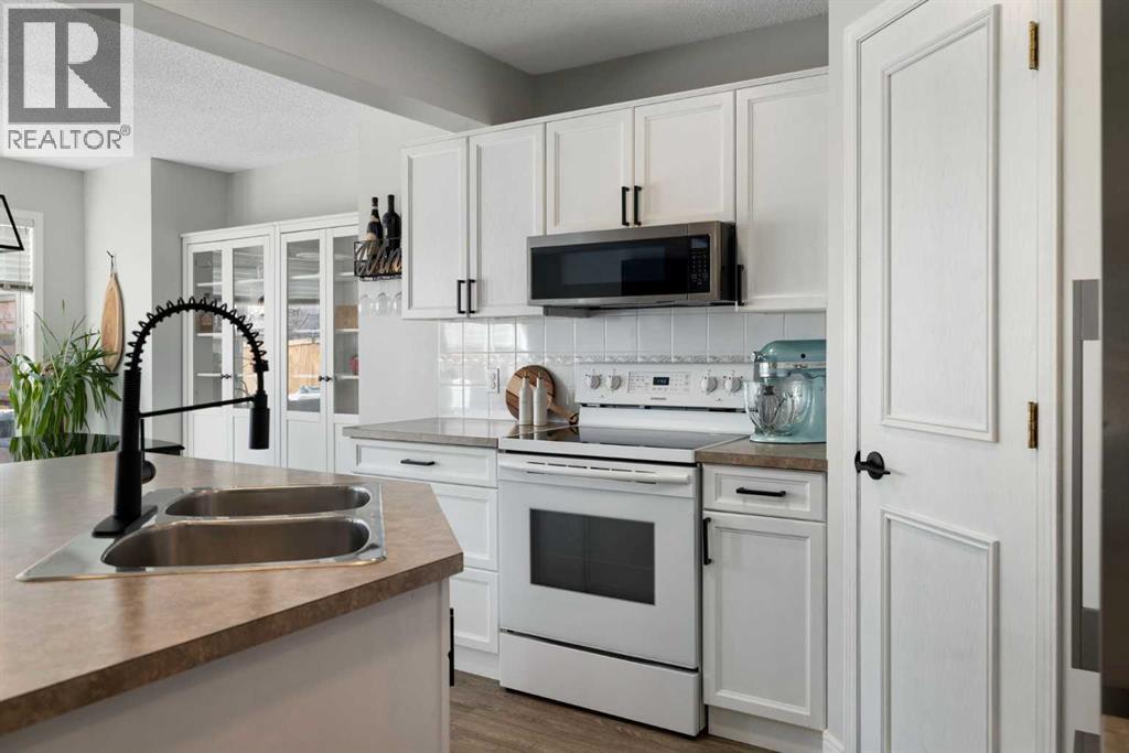 316 Mt Brewster Circle SE, Calgary, Alberta  T2Z 3J2 - Photo 3 - A2296159